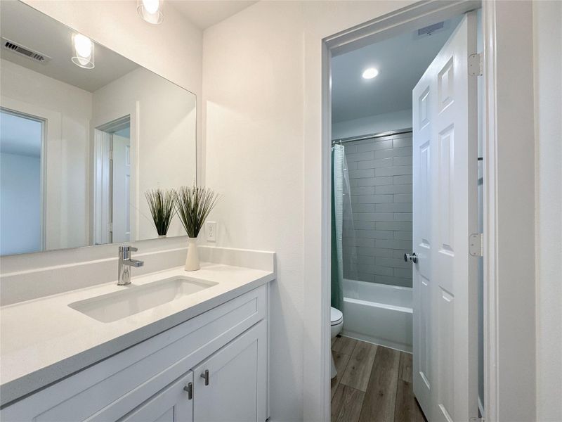 Furnished interior view inside a new home in , Conroe (Image 35).