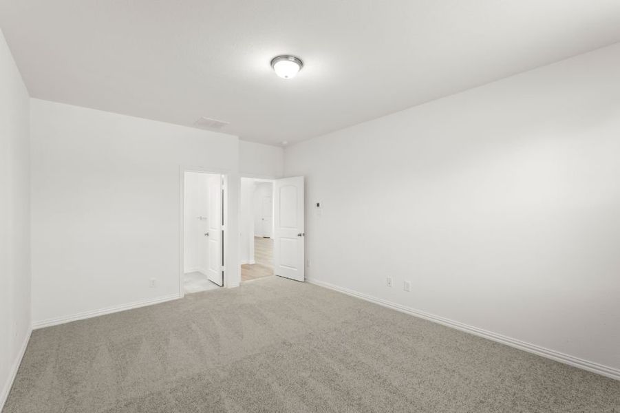 Representative unfurnished interior of a home built from the Lamar by UnionMain Homes in Elevon, Lavon (Image 17).