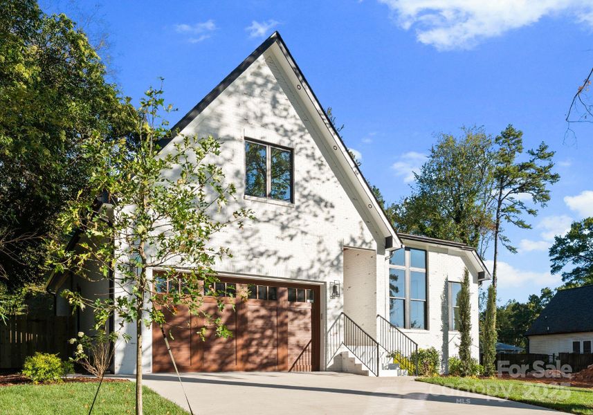Front exterior of a new home in , Charlotte, NC, highlighting curb appeal (Image 26). Front exterior of a new home in , Charlotte, NC, highlighting curb appeal (Image 26).