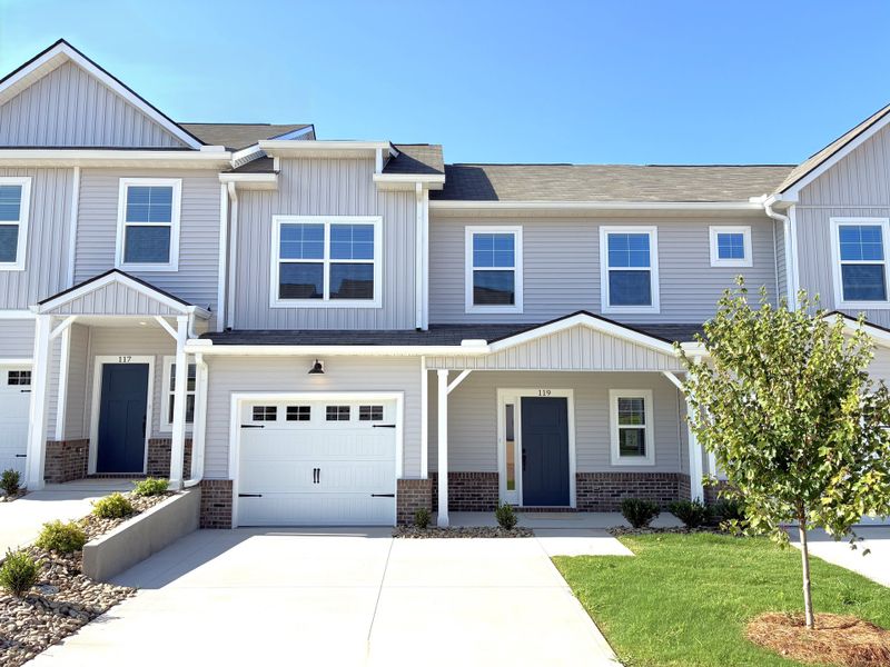 Front exterior of a new home in Holly Ridge, Greenville, SC, highlighting curb appeal (Image 1). Front exterior of a new home in Holly Ridge, Greenville, SC, highlighting curb appeal (Image 1).
