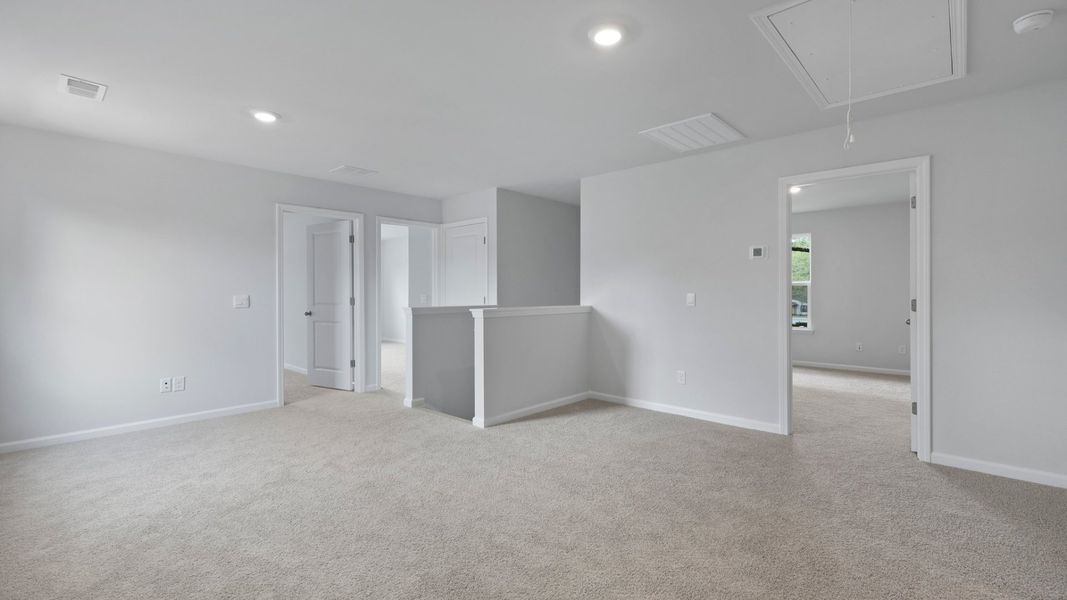 Representative unfurnished interior of a home built from the RUBY by D.R. Horton in Founders Corner, Summerville (Image 14).