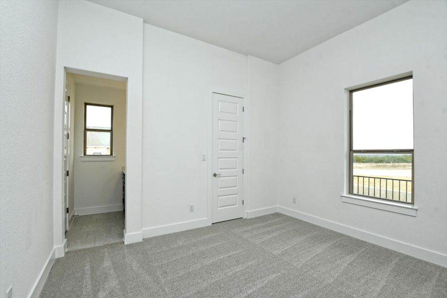 Representative unfurnished interior of a home built from the Madera II by Giddens Homes in Scofield Farms Estates, Georgetown (Image 448).