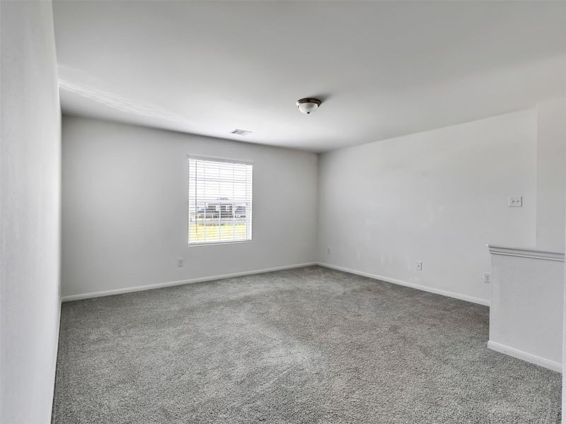 Spacious, unfurnished interior of a new home in Sweetgrass Village, Barrett (Image 16).