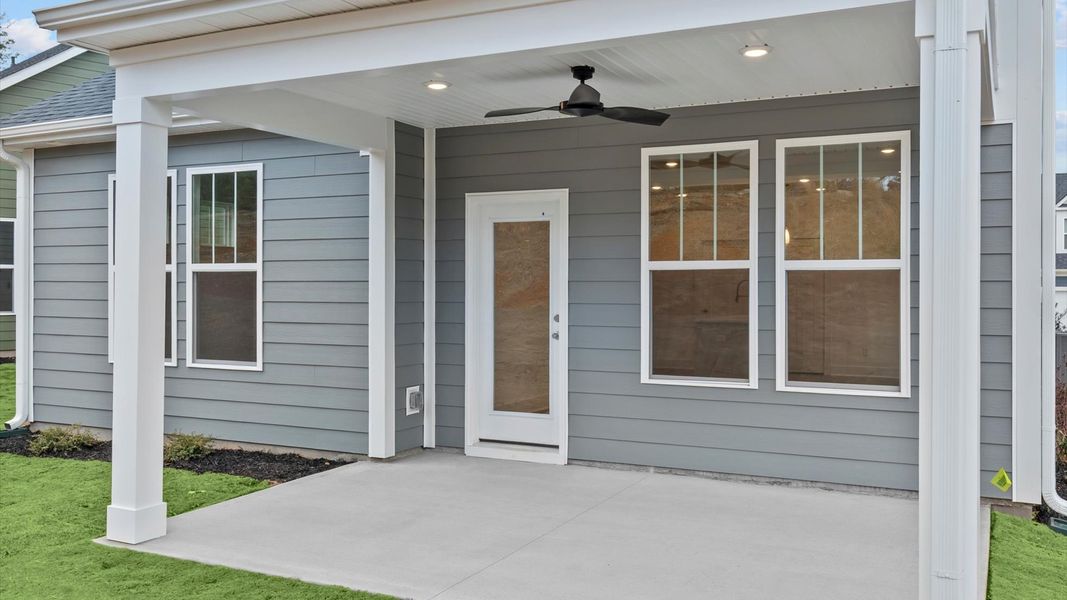 Exclusive rear covered porch with accomplished detail and elevated outdoor living potential in Moore, SC