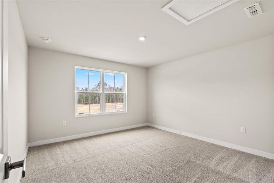 Spacious, unfurnished interior of a new home in Lakes at Riverbend, Navassa (Image 12).