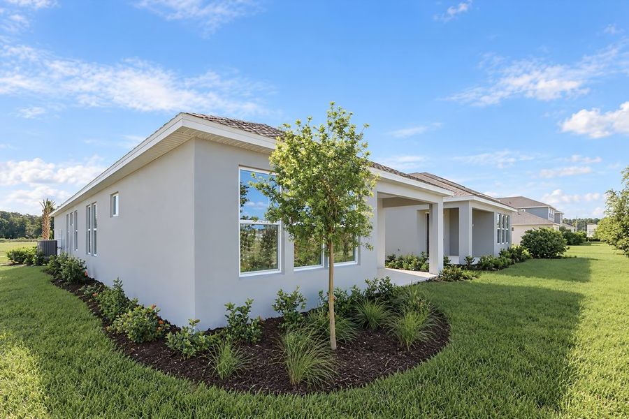 Exterior details and patio area of a home in Lochside, Mount Dora (Image 33).