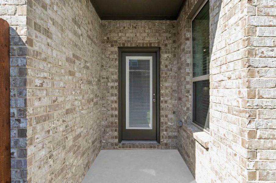 Front exterior of a new home in Sereno Oaks at Buckner Terrace, Dallas, TX, highlighting curb appeal (Image 26).