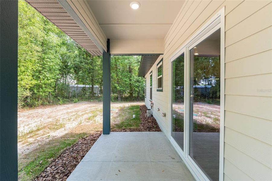 Exterior details and patio area of a home in , Fort White (Image 31).