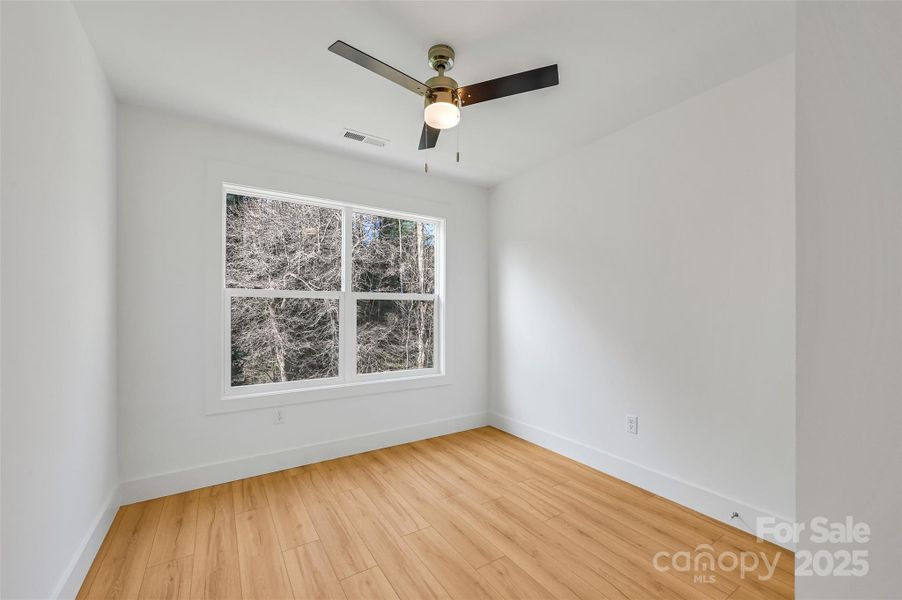 Spacious, unfurnished interior of a new home in , Asheville (Image 15).