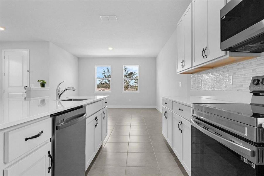 Furnished interior view inside a new home in , St. Cloud (Image 8).