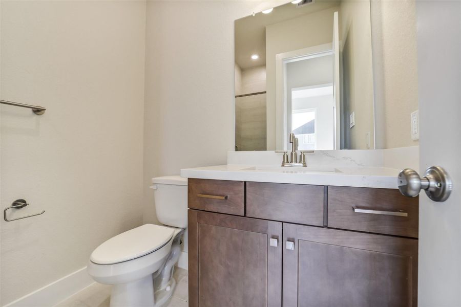 Furnished interior view inside a new home in Sunterra, Katy (Image 16).