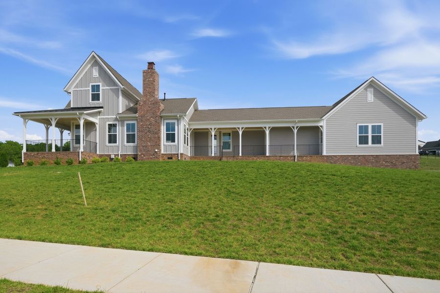 Front exterior of a new home in Richvale Estates, Fairview, TN, highlighting curb appeal (Image 27). Front exterior of a new home in Richvale Estates, Fairview, TN, highlighting curb appeal (Image 27).