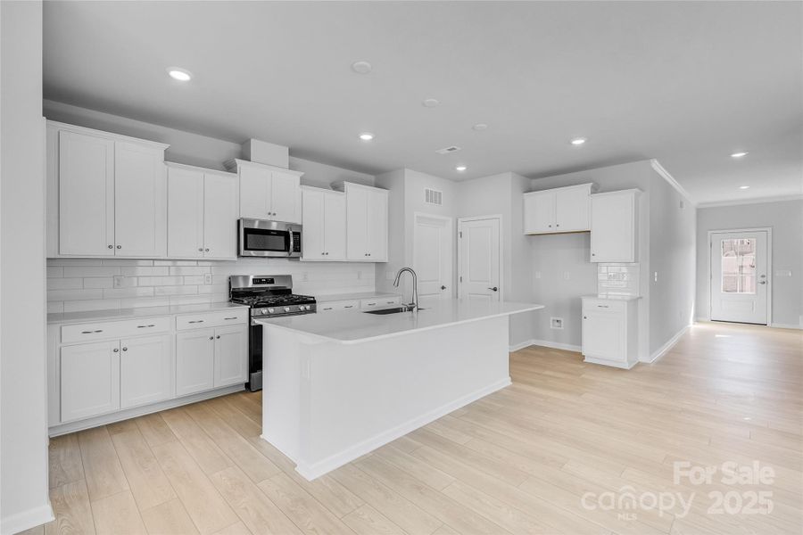 Furnished interior view inside a new home in Redhawk: Walk, Belmont (Image 13).