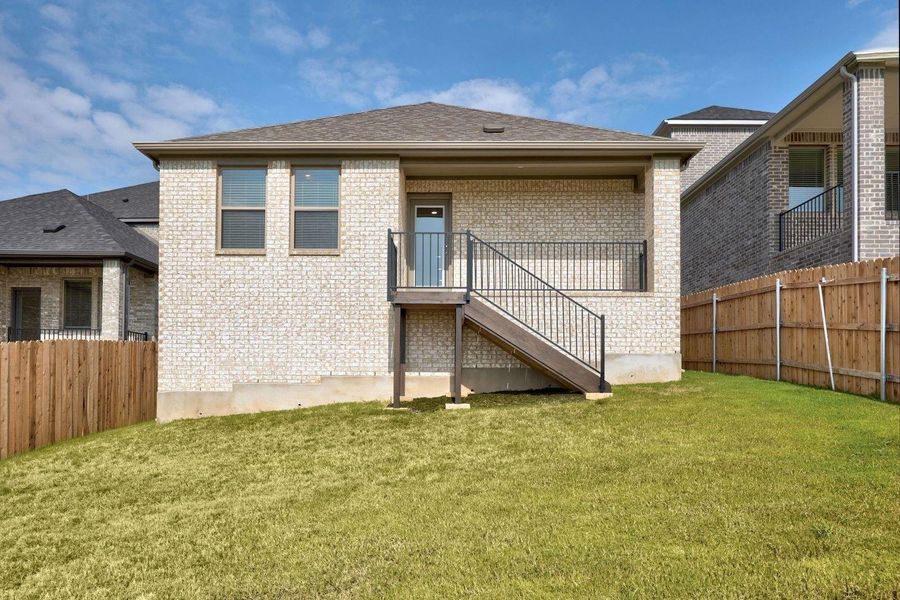 Exterior details and patio area of a home in Lakeside at Tessera, Lago Vista (Image 3). Exterior details and patio area of a home in Lakeside at Tessera, Lago Vista (Image 3).