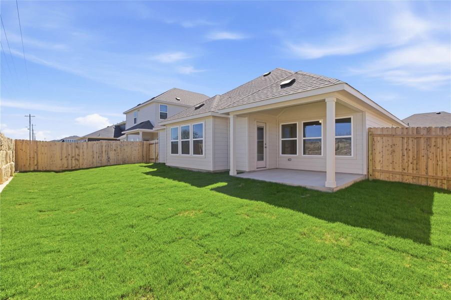 Exterior details and patio area of a home in Hunters Glen, Jarrell (Image 16).