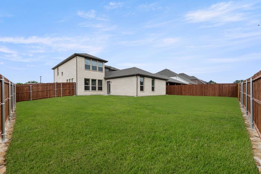Representative exterior photo of a completed home built from the Phoenix by Impression Homes in Keeneland, Aubrey, TX (Image 25). Representative exterior photo of a completed home built from the Phoenix by Impression Homes in Keeneland, Aubrey, TX (Image 25).
