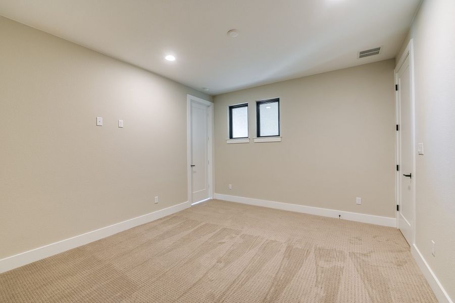 Representative unfurnished interior of a home built from the Sapphire by Giddens Homes in Riverstone, Georgetown (Image 57).