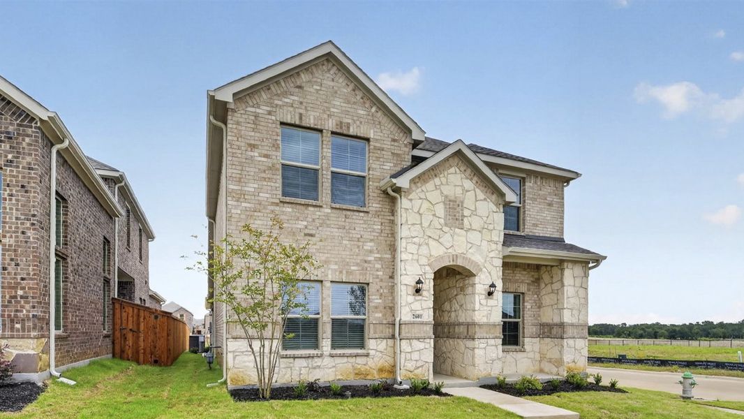 Representative exterior photo of a completed home built from the Rosemary by D.R. Horton in Lilybrooke at Legacy Hills, Celina, TX (Image 2). Representative exterior photo of a completed home built from the Rosemary by D.R. Horton in Lilybrooke at Legacy Hills, Celina, TX (Image 2).