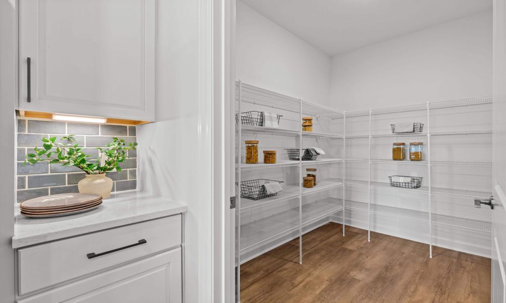 Representative furnished interior of a home built from the The Longboard by Chesapeake Homes in Bridgewater - Shorehaven Village, Little River (Image 13).