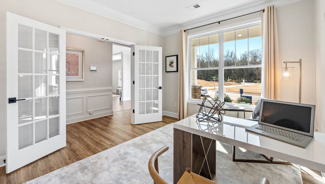 Representative furnished interior of a home built from the Graymount by D.R. Horton in Hunters Creek, Greenwood (Image 9).