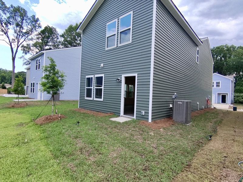 Exterior details and patio area of a home in Pinckney Place, North Charleston (Image 3).