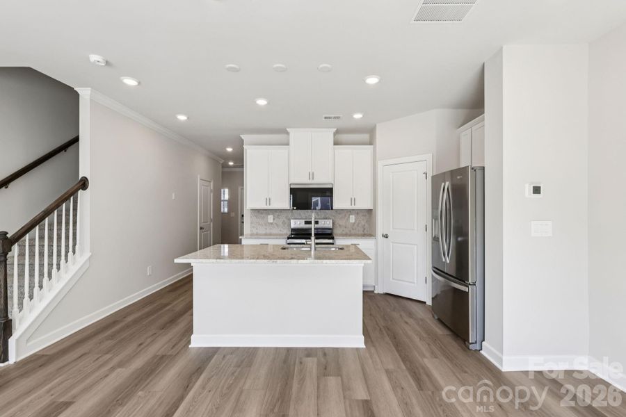 Photo is not of the actual home, but is an inspirational photo of builder’s model home and may depict options, furnishings, and/or decorator features that are not included