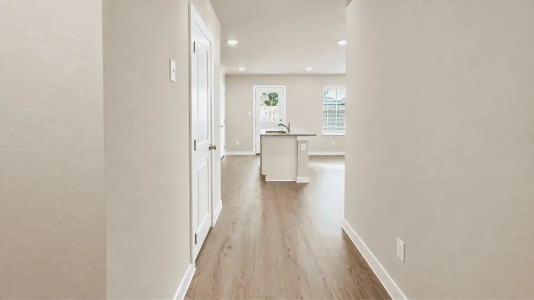 Representative unfurnished interior of a home built from the Davis by D.R. Horton in Flagstop Crossing, Odem (Image 11).