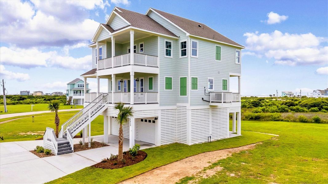 Discover 25830 Bay Breeze Drive: a stunning 4-bedroom, 3.5-bath home with breathtaking beach and bay views from multiple decks.