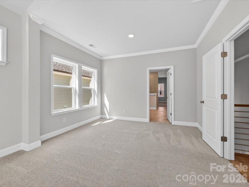 Spacious, unfurnished interior of a new home in North Creek Village, Huntersville (Image 42).