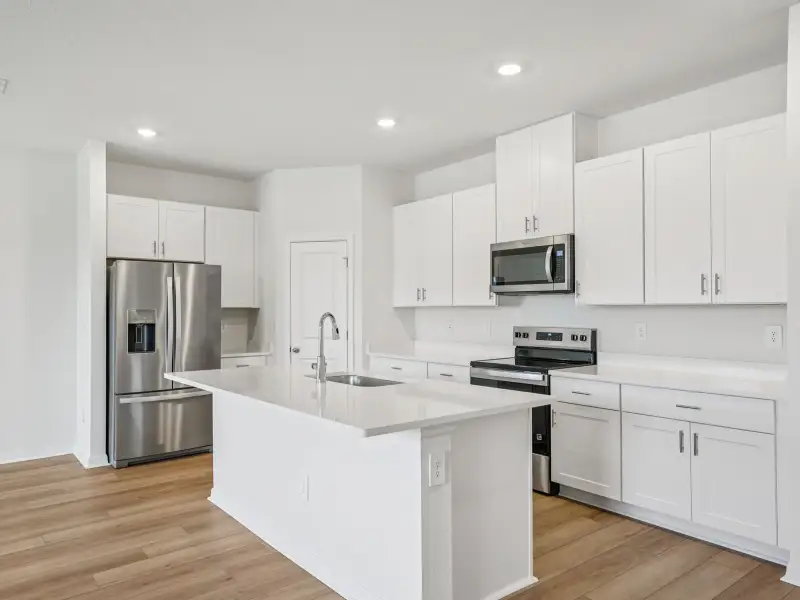 Furnished interior view inside a new home in Salt Meadows - Classic Series, Parrish (Image 3).