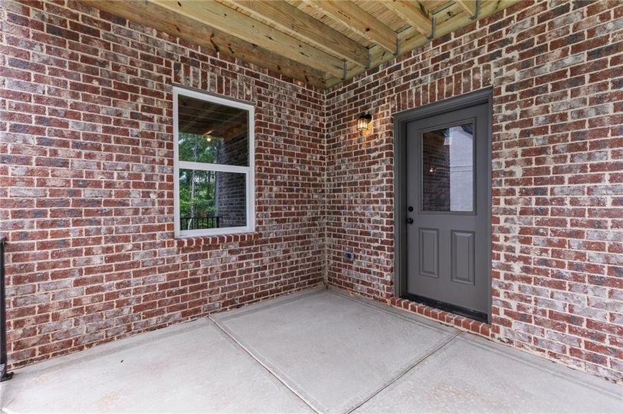 Front exterior of a new home in , Buford, GA, highlighting curb appeal (Image 23). Front exterior of a new home in , Buford, GA, highlighting curb appeal (Image 23).