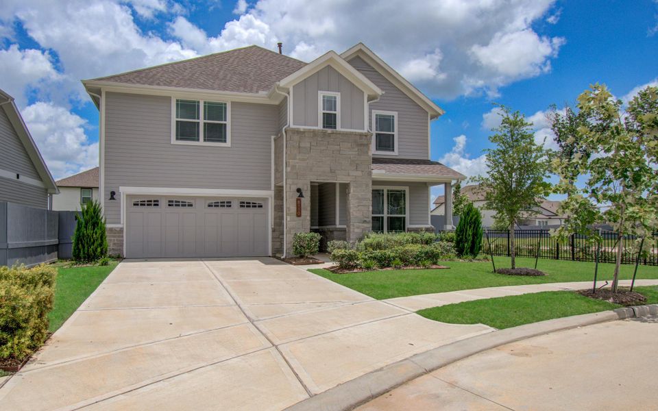 Front exterior of a new home in , Fulshear, TX, highlighting curb appeal (Image 21). Front exterior of a new home in , Fulshear, TX, highlighting curb appeal (Image 21).