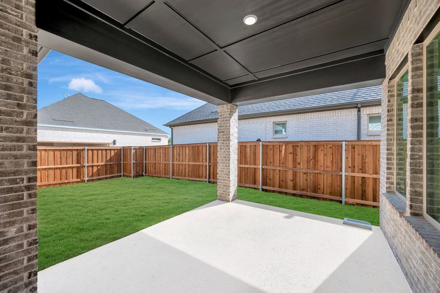 Exterior details and patio area of a home in Elements at Viridian - Signature Series, Arlington (Image 4). Exterior details and patio area of a home in Elements at Viridian - Signature Series, Arlington (Image 4).