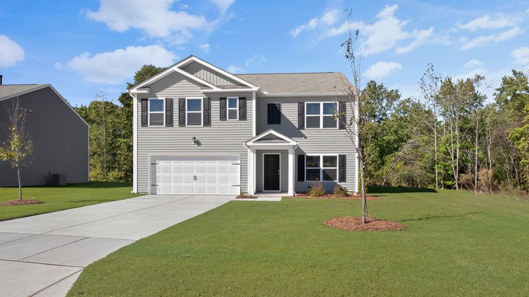 Front exterior of a new home in Olive Branch, Clayton, NC, highlighting curb appeal (Image 2).