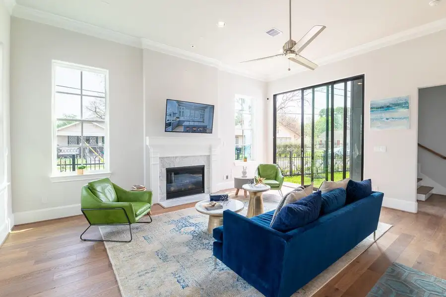10' sliding glass doors to back patio and large yard.  Similar plan and finishes.