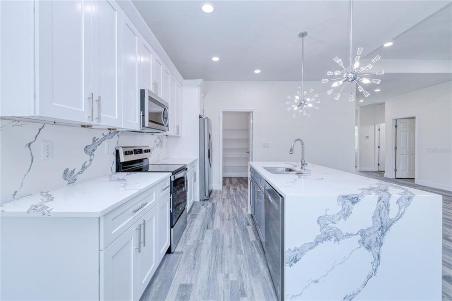 Furnished interior view inside a new home in , Port Charlotte (Image 6). Furnished interior view inside a new home in , Port Charlotte (Image 6).