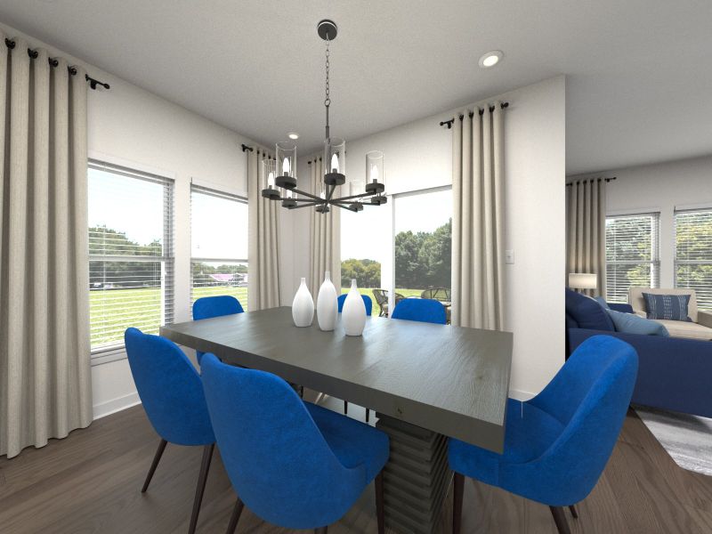 The open floorplan creates a seamless flow between the kitchen and dining areas.