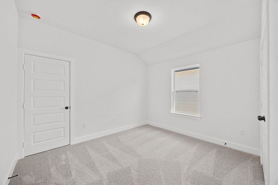 Spacious, unfurnished interior of a new home in The Colony, Bastrop (Image 38).
