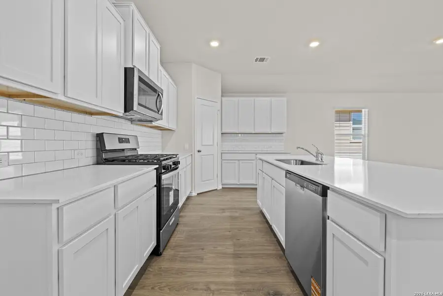 Furnished interior view inside a new home in Redbird Ranch, San Antonio (Image 7).