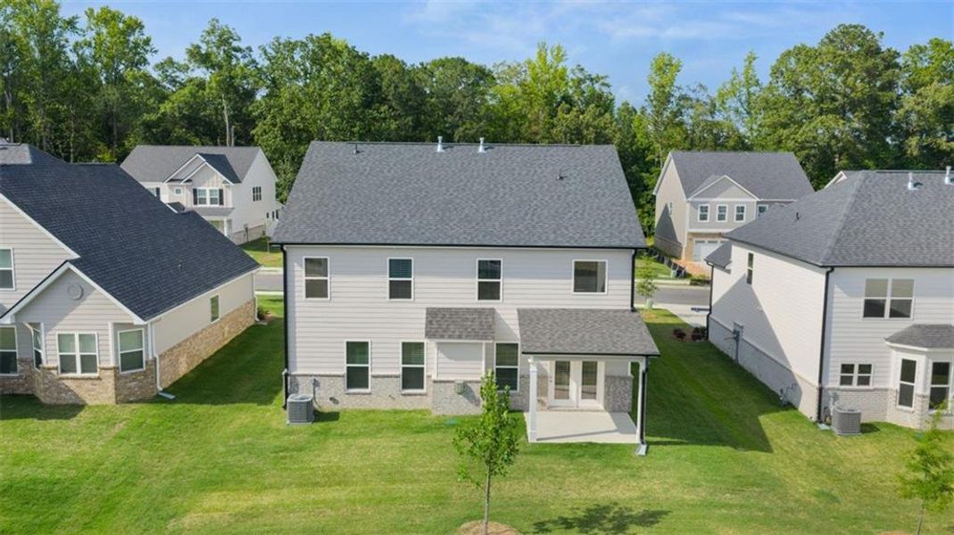 Exterior details and patio area of a home in The Gates at Pates Creek, Hampton (Image 23).