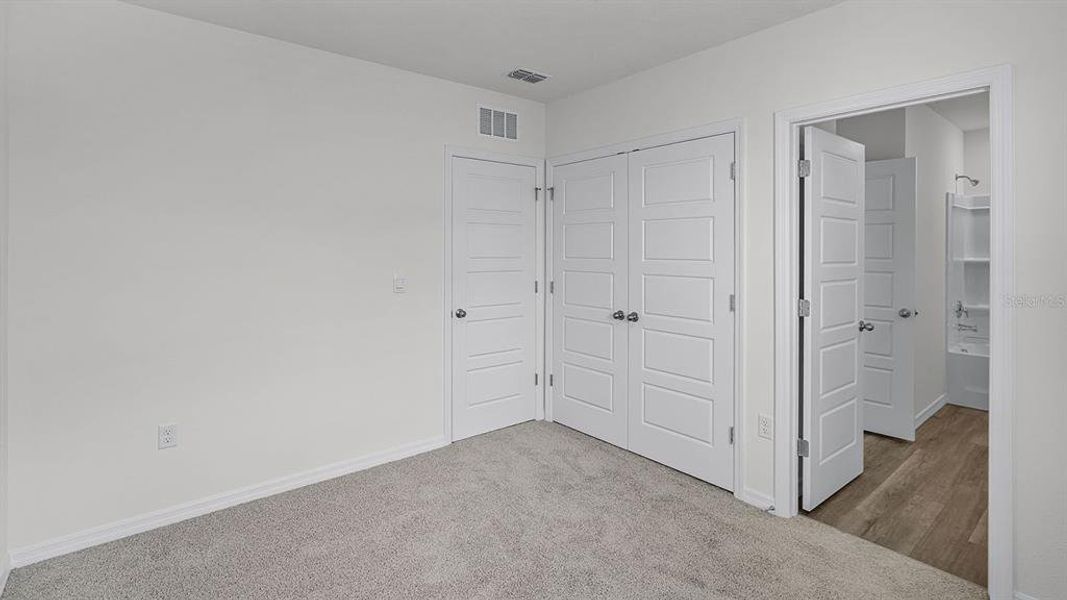 Spacious, unfurnished interior of a new home in Harmony at Lake Eloise, Winter Haven (Image 28).