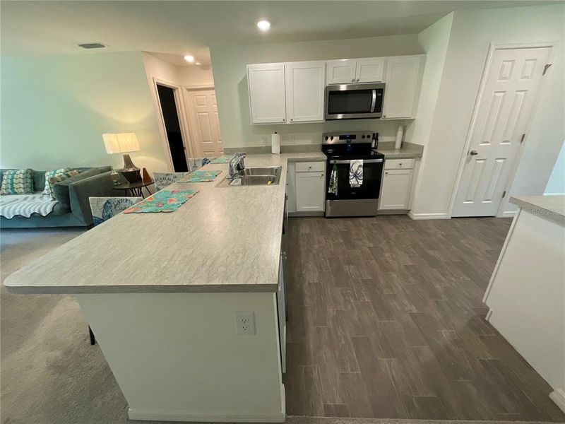 Furnished interior view inside a new home in , Port Charlotte (Image 36).