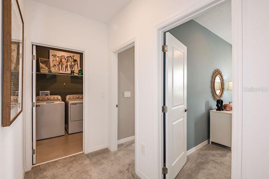 Furnished interior view inside a new home in Harvest at Ovation, Winter Garden (Image 32).