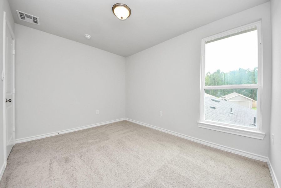 Spacious, unfurnished interior of a new home in The Enclave at Spring Branch, Conroe (Image 33).