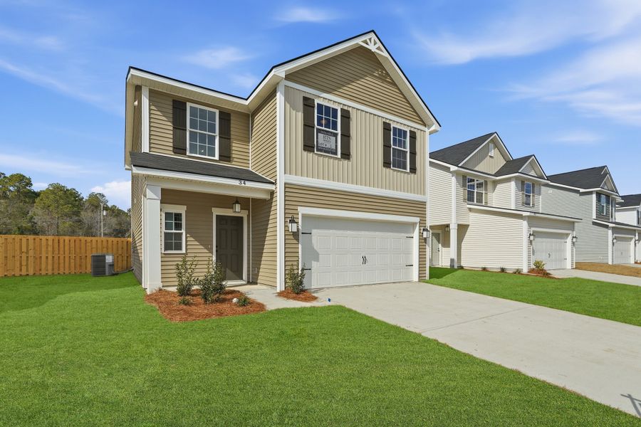 Representative exterior photo of a completed home built from the The Ryon by RTS Homes in Grand Reserve, Hinesville, GA (Image 20).