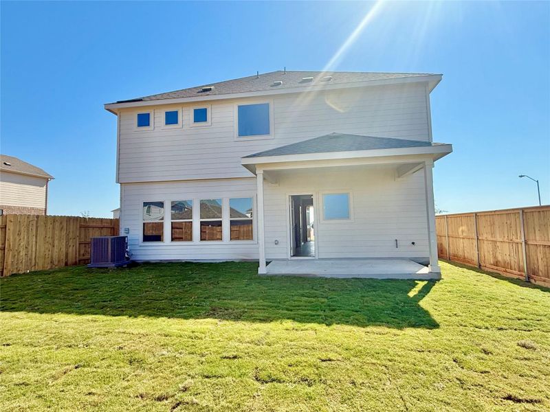 Rear view of house featuring a patio and a fenced backyard Rear view of house featuring a patio and a fenced backyard