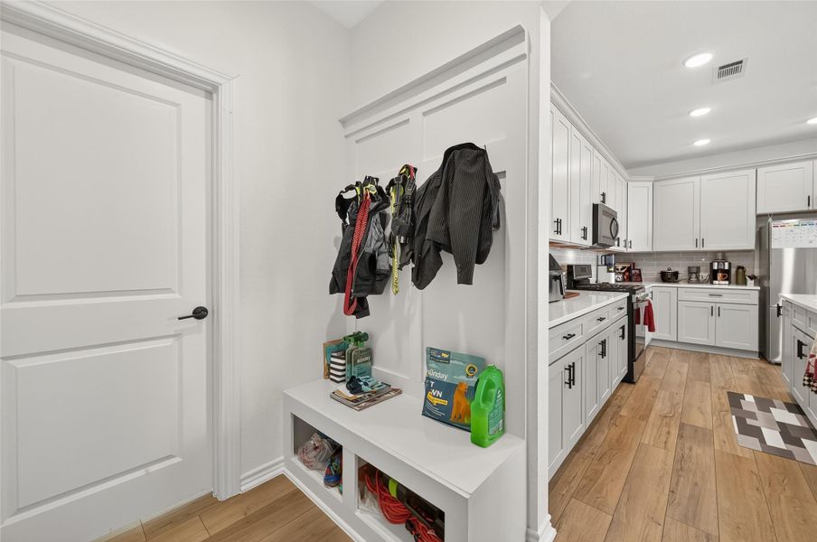 Furnished interior view inside a new home in Sunterra, Katy (Image 9).