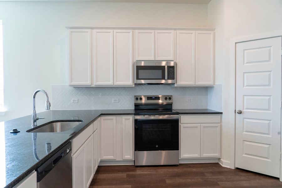 Furnished interior view inside a new home in Pecan Grove, Navasota (Image 3).