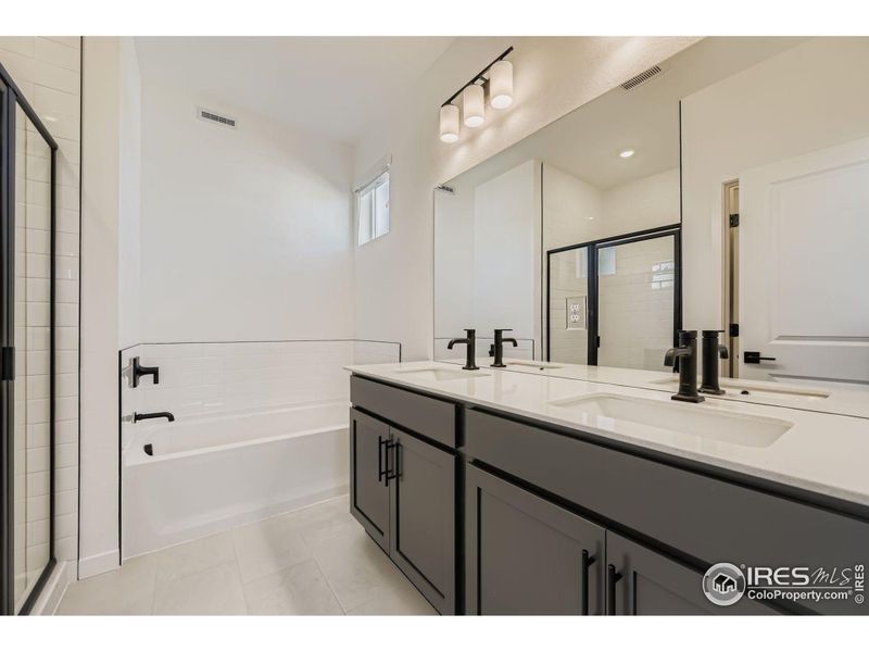 Primary 5-peice bath with upgraded Kohler fixtures. Primary 5-peice bath with upgraded Kohler fixtures.