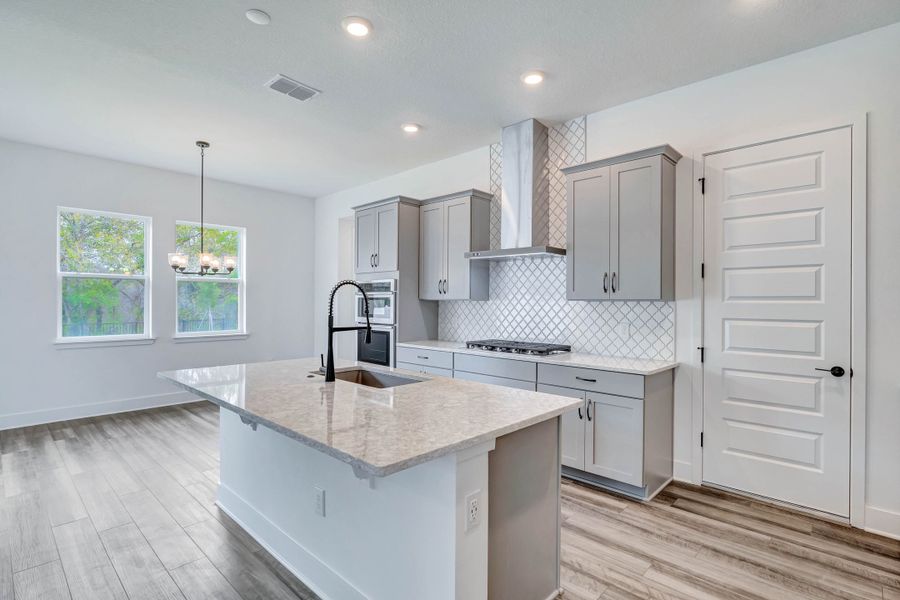 Representative furnished interior of a home built from the Faulkner by Rockwell Homes in Northlake At Ovation, Winter Garden (Image 14).